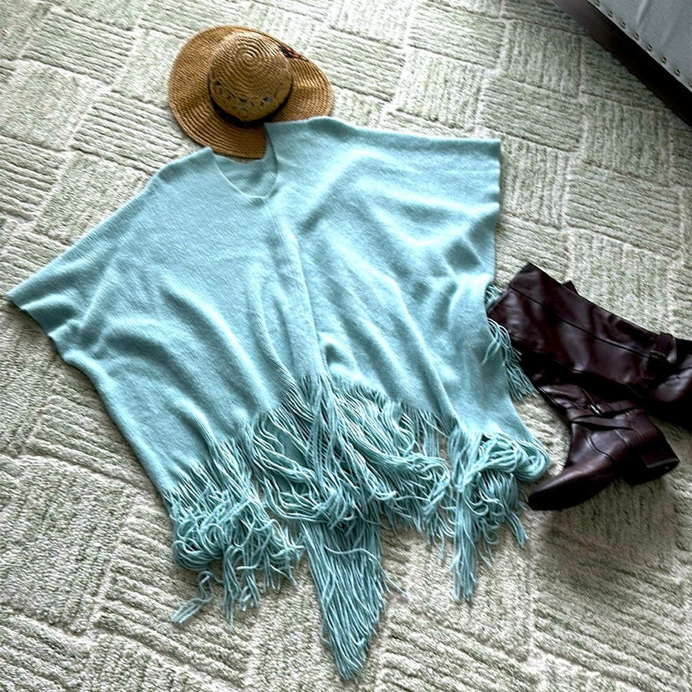 Light aqua sweater fringe poncho. One size